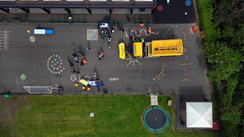aerial shot of Springview pupils with a snowplough