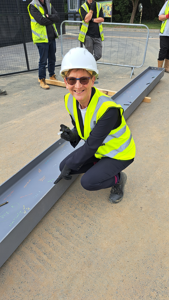 DfE member signs the steels