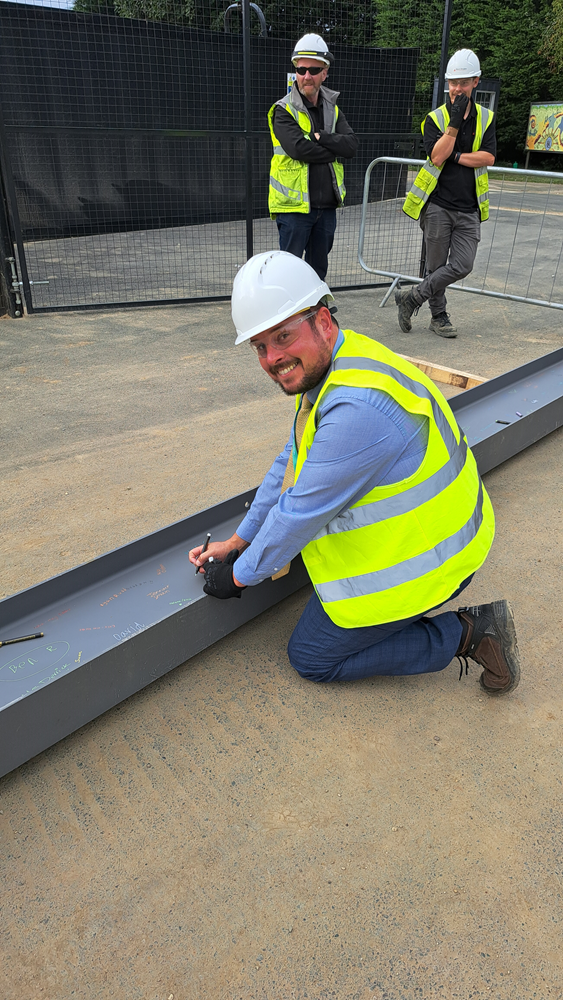 DfE member signs the steels